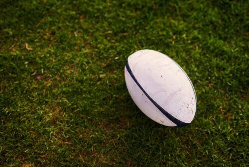 Cropped shot of a rugby ball on an empty rugby fie 2022 09 30 19 00 12 utc
